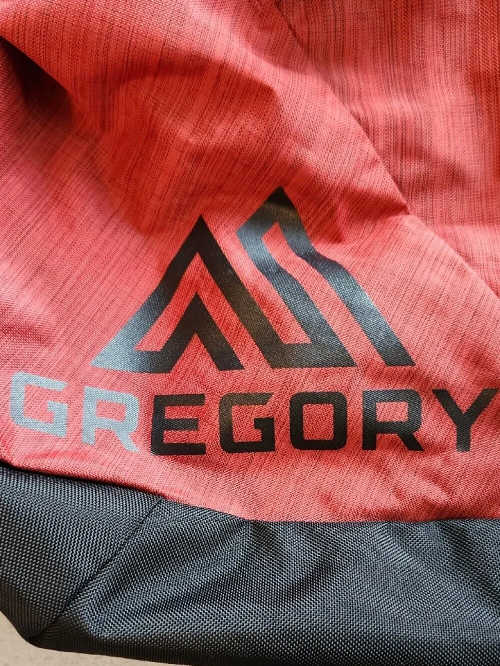 Gregory Red Stash 95 Travel Duffel with Black Accents